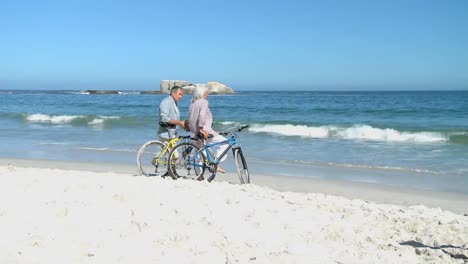 elderly woman talking with his husband after a bike ride