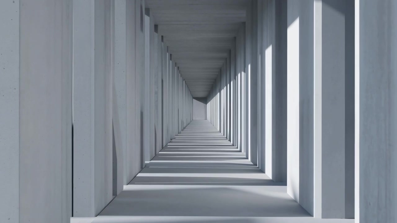 Corridoio moderno vuoto visto da una prospettiva centrale, con colonne e pareti bianche che si perdono in lontananza. La forte luce diurna crea ombre nette e un