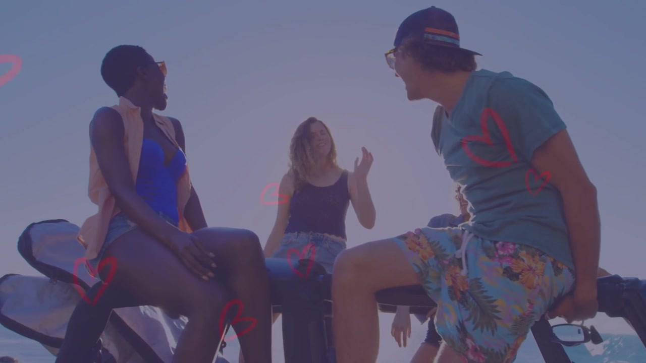 Dancing center woman initiating playful gestures on vehicle trunk near ocean, man with cap reacting