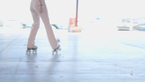 person roller skating in an empty indoor space