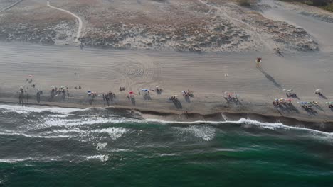 Drone-footage-of-the-waves-rolling-in-on-the-beach-in-Linea-De-La-Concepcion,-near-Gibralter