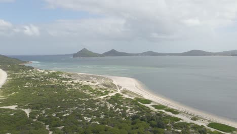 Karuah-River-And-Shoal-Bay-From-Waynderrabah-Beach---Tomaree-Mountain-And-Peninsula-With-Estuary-In-Foreground-Near-Hawks-Nest,-NSW,-Australia