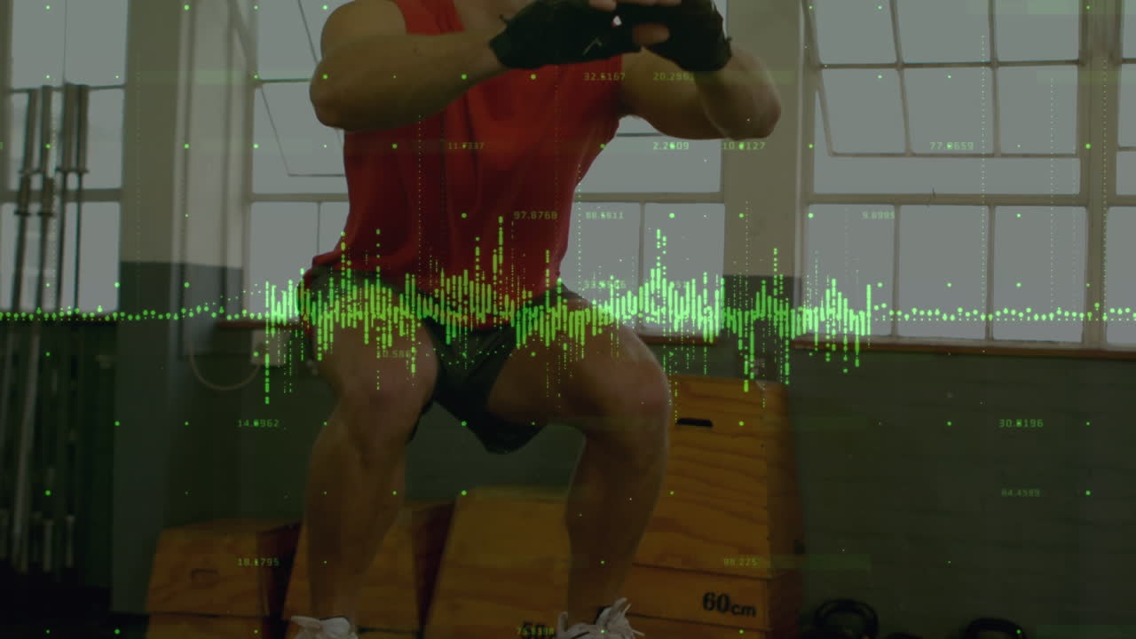 체육관에서 점프하는 백인 남성에 대한 금융 데이터 처리의 애니메이션