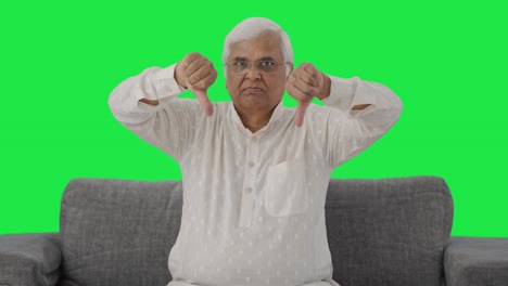 Angry-Indian-old-man-showing-thumbs-down-Green-screen