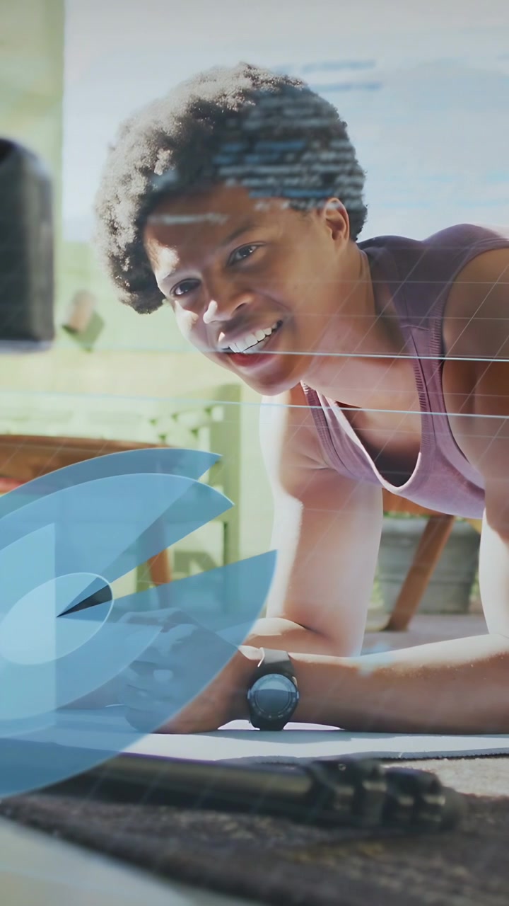 Vertical video: Man holding plank, using fitness app on phone, smiling while blue circle obscuring