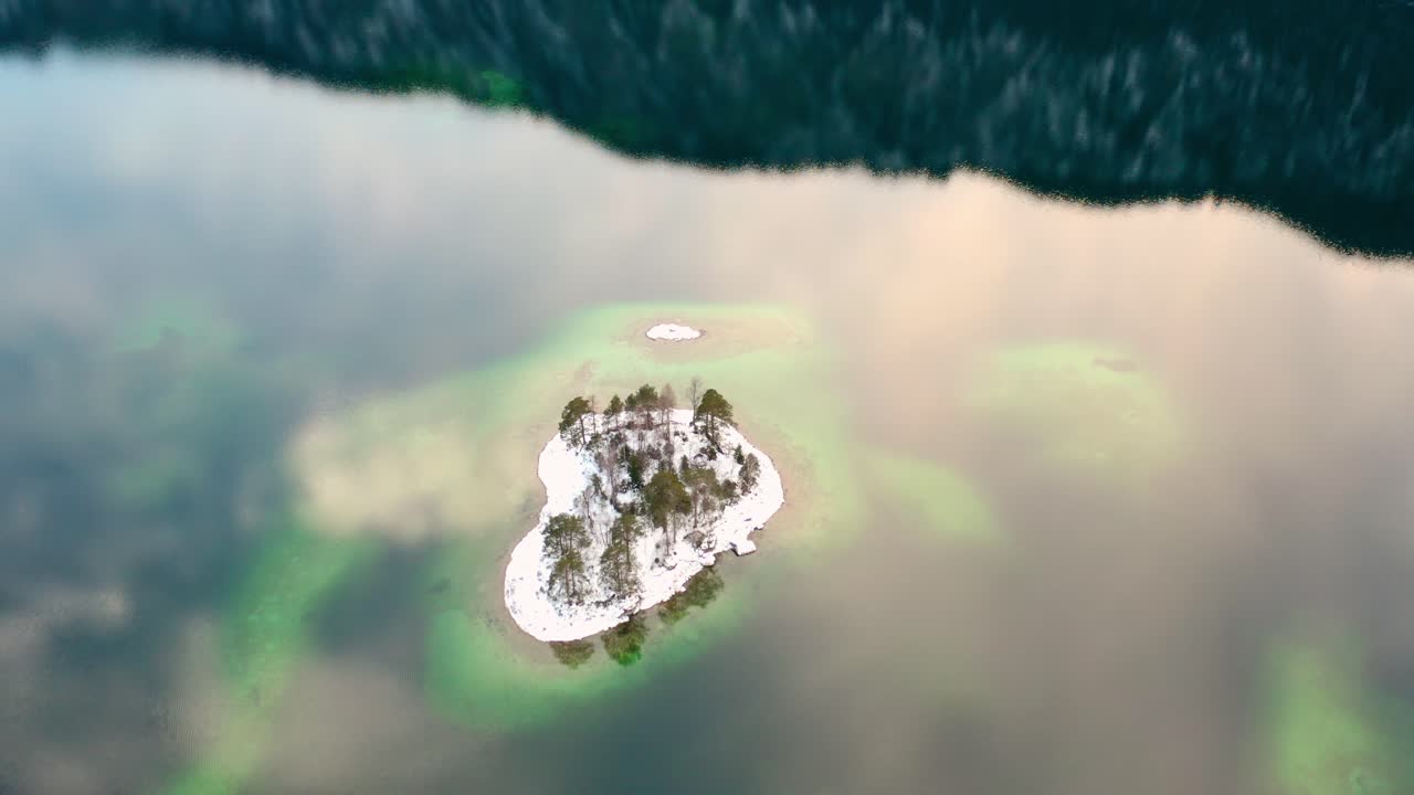A lonely island in lake Eibsee in Germany