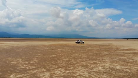 off road pickup truck in the desert, drone shot