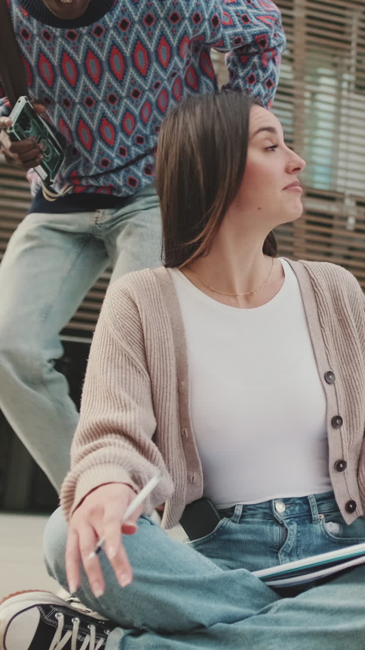 College Students Chatting and Studying Outdoors