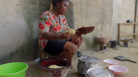 black-African-woman-preparing-fufu-traditional-street-food-in-west-africa,-expert-skilled-African-chef