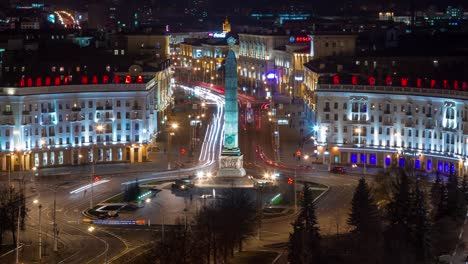 night illuminated minsk victory square traffic circle rooftop panorama 4k timelapse belarus