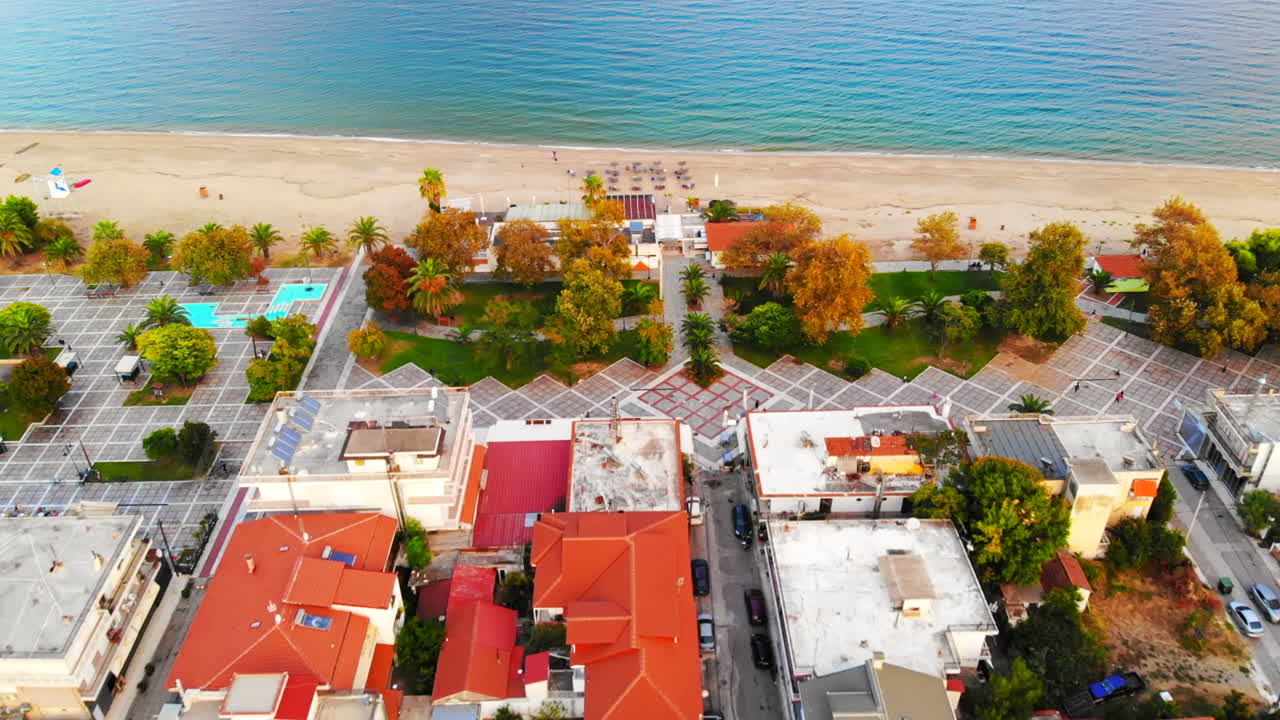Panorama of the Asprovalta with multiple buildings, Saint George church among the buildings. Aegean sea coast. Sunny day. Greece