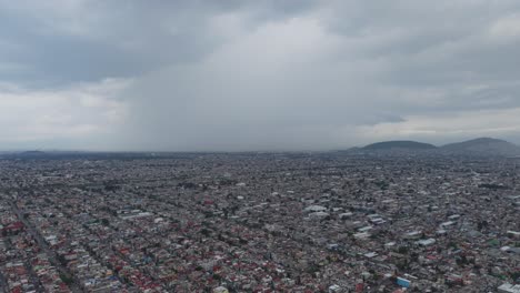 Rain falling on Mexico City, drone shot from Ecatepec