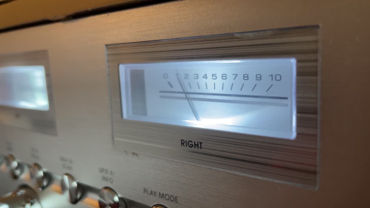 Close-up of VU meter on vintage stereo receiver
