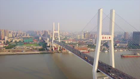 china day time shanghai cityscape traffic lupu bridge riverside aerial panorama 4k