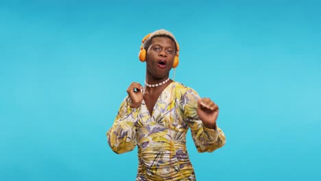 african american gay person listening to music