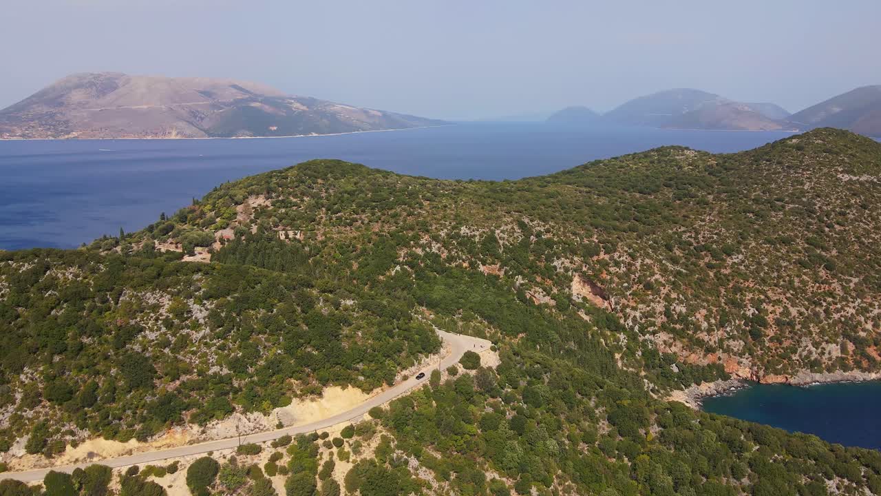 Flying over mountain landscape and Ionian sea in Greece