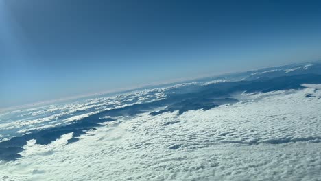 Awesome-pilot-point-of-view-during-a-right-turn-flying-near-the-french-italian-border-over-the-Alps-mountains-af-12000-metres-high