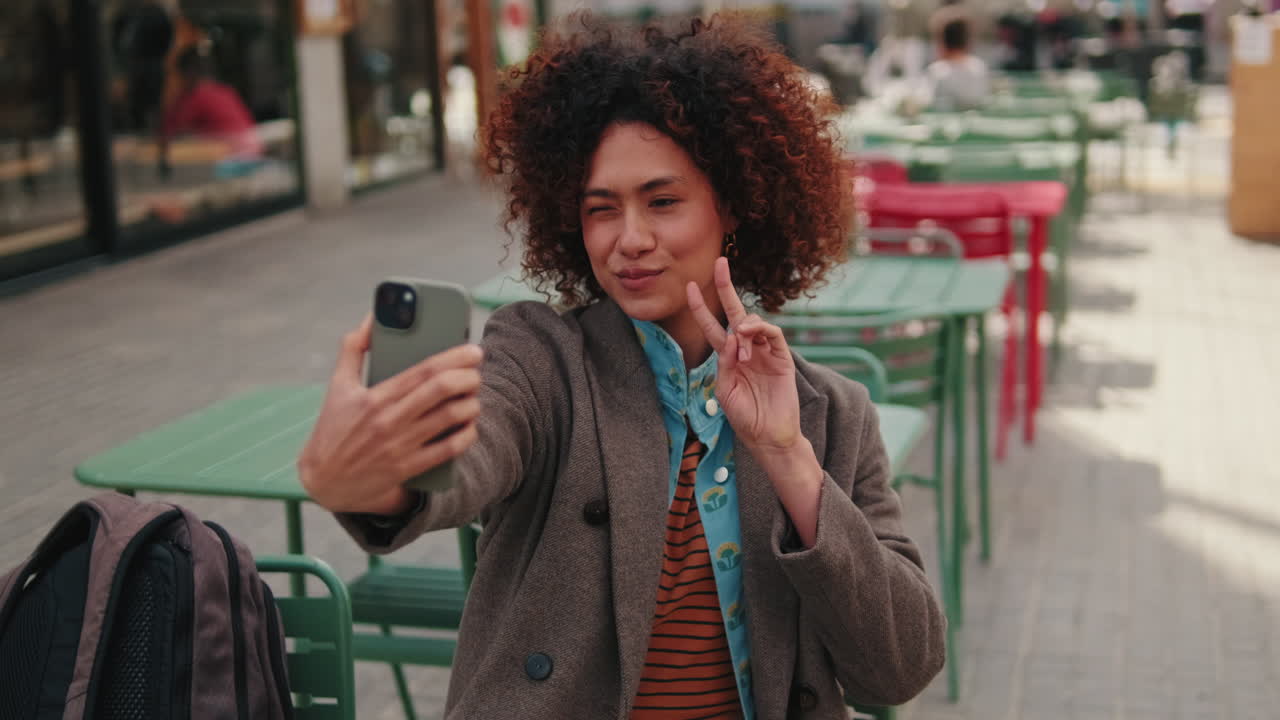 Woman Taking a Selfie Outdoors