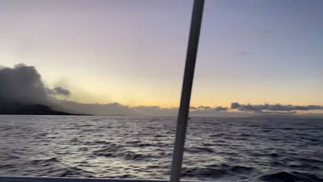dramatic storm clouds over ocean at sunset