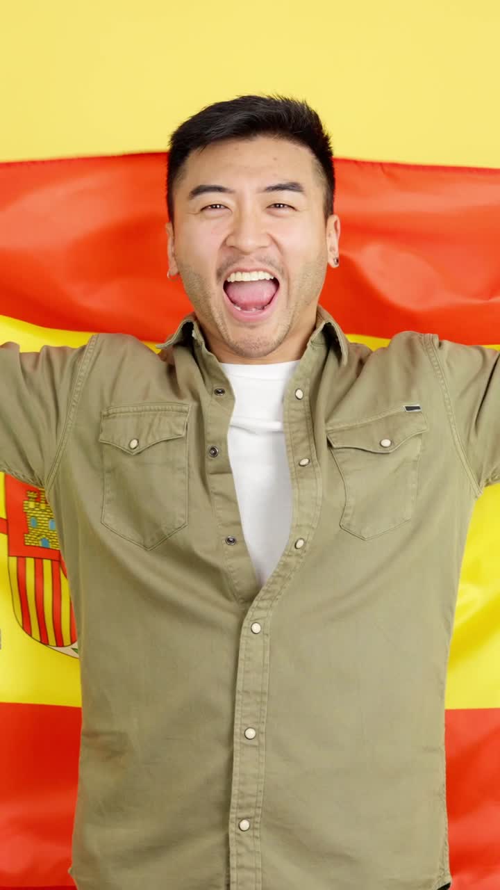 Man holding Spanish flag