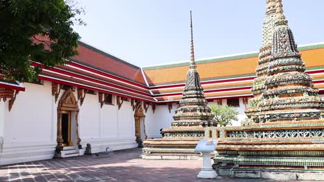 serene temple courtyard with ornate stupas