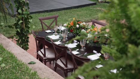 wedding banquet table with colorful floral centerpieces