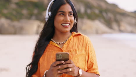 Music-headphones,-phone-and-woman-at-beach