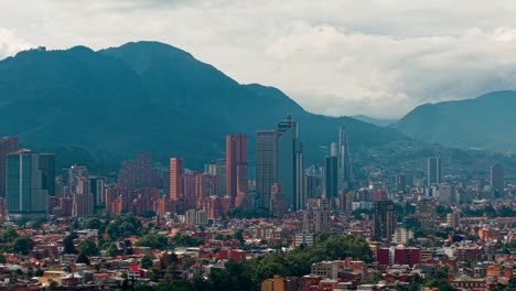 telephoto drone shot orbiting the downtown of bogota, daytime in colombia