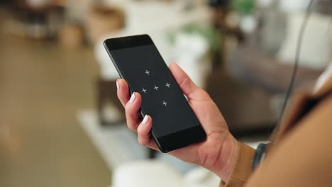 headset clerk holds tracked phone in slow motion over-shoulder retail view
