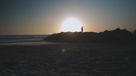santa monica beach sun set shot with silhouette