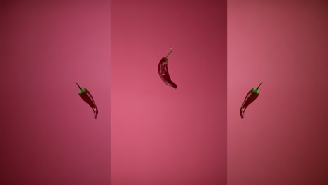 fresh spicy chili peppers tossed up flying hanging in the air and falling down