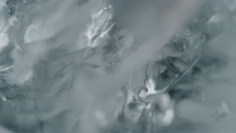 close-up view of melting ice in clear water