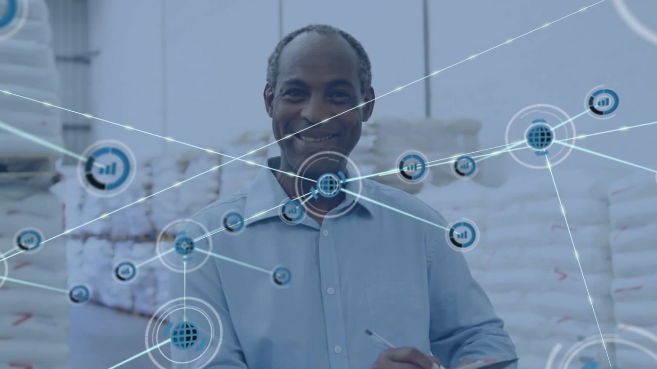 Animation of network of digital icons on male supervisor writing on clipboard at warehouse