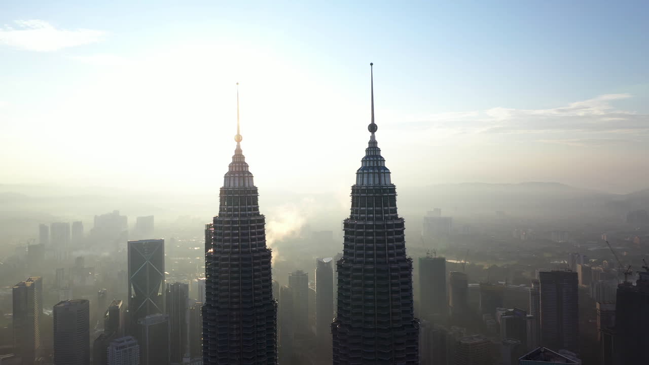 Kuala Lumpur, Malaysia Twin Tower, Aerial view Sunrise soft light with Low Fog.