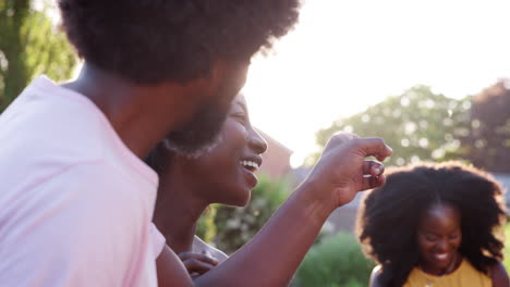 Family-having-fun-during-a-family-barbecue