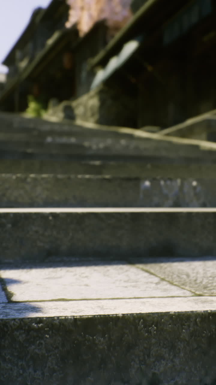 Historic stone steps to traditional buildings in a quaint village