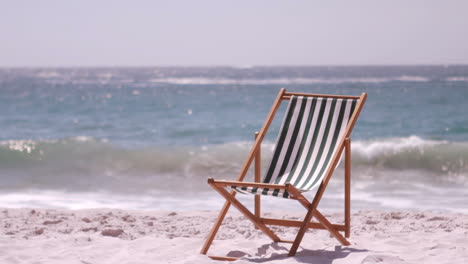 A-deck-chair-is-in-the-sand