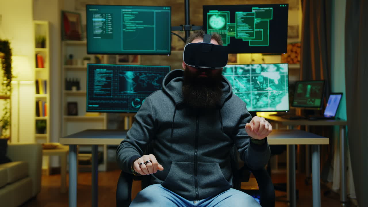Bearded hacker wearing a virtual reality goggles