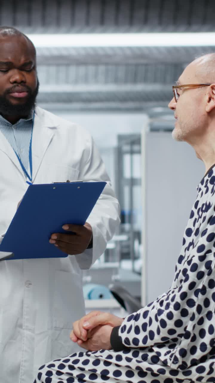 Vertical Video Medical researchers conducting patient evaluation in a laboratory drug study