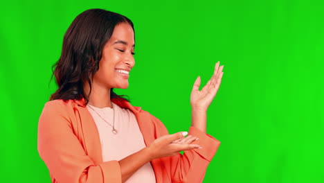 Woman,-presenting-and-green-screen-with-happiness