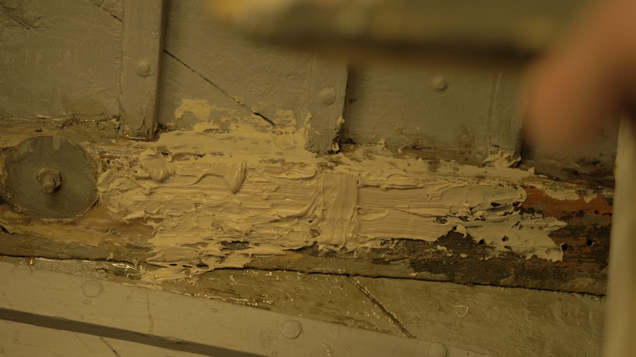 Applying fillers over fiberglass restored wood rot inside wooden boat