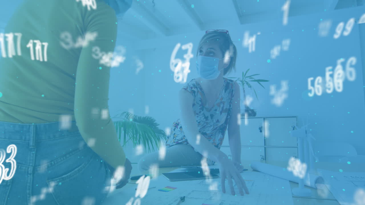 사무실에서 얼굴 마스크를 쓰고 있는 동료들과 함께 떠다니는 숫자의 애니메이션