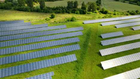 Aerial-View-Of-Solar-Power-Plant---Solar-Panels-In-Rural-Field