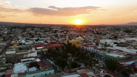 drone flying around the san luis obispo baroque, sunset in huamantla, tlaxcala mexico