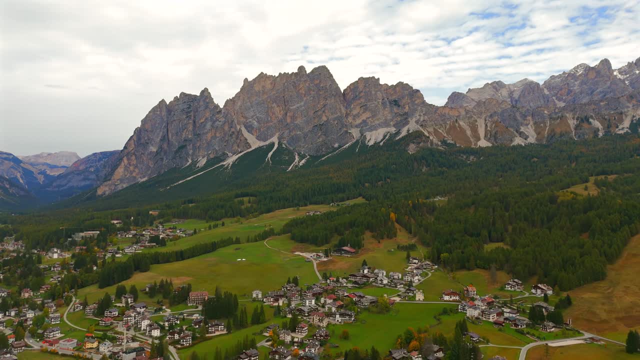 A winter wonderland unfolds as the drone soars over Cortina’s landscape.