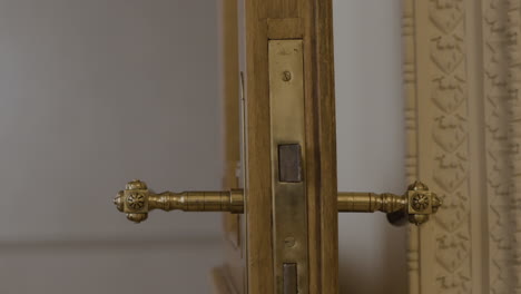 antique wooden door with brass hardware