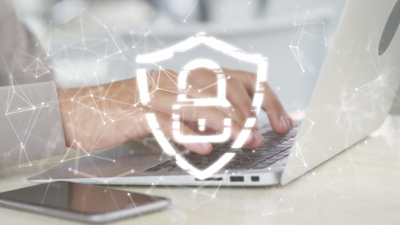 Animation of padlock, data processing and networks over man using laptop