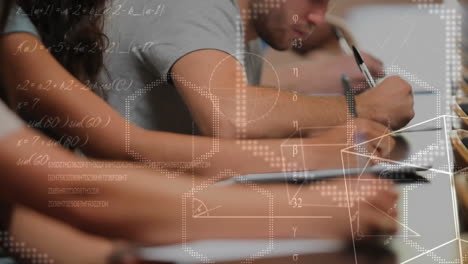 students sitting on desks writing notes
