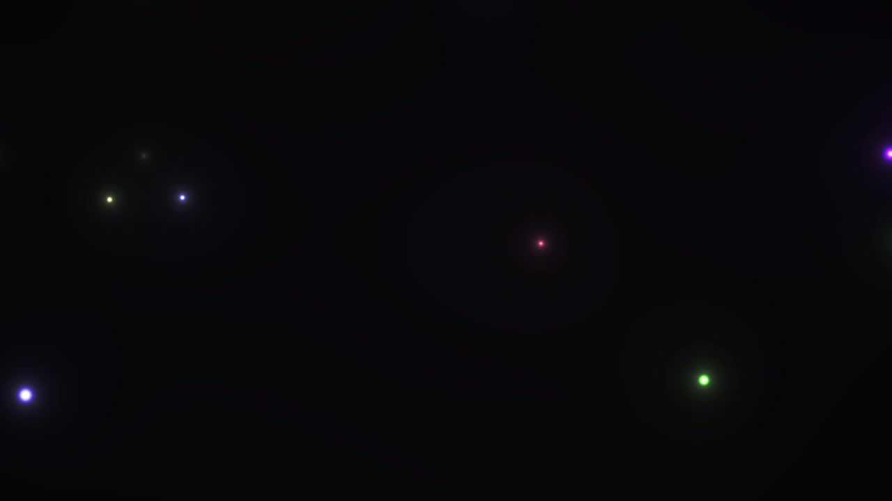 Abstract Background with Floating Colorful Glowing Particles on Black
