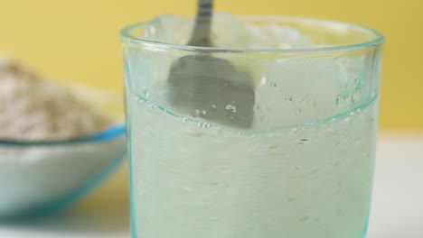 Psyllium-seeds-in-a-glass-container-on-table